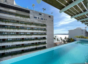 Casa Las Palmas - Condos by the Beach with Rooftop Pool